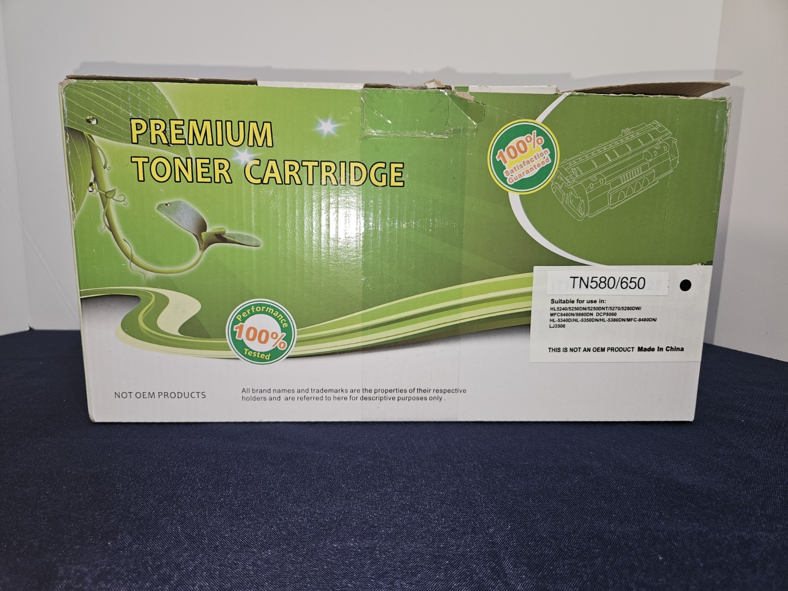 Premium toner cartridge tn580/650 Opened and damaged box as shown in the picture