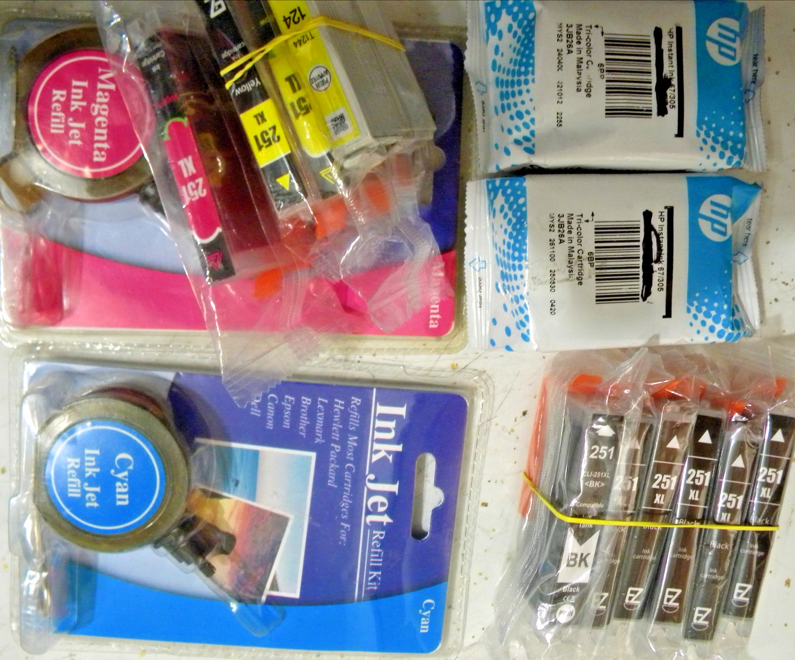 Lot of assorted ink cartridges and refill kits for ink jet printers all sealed.