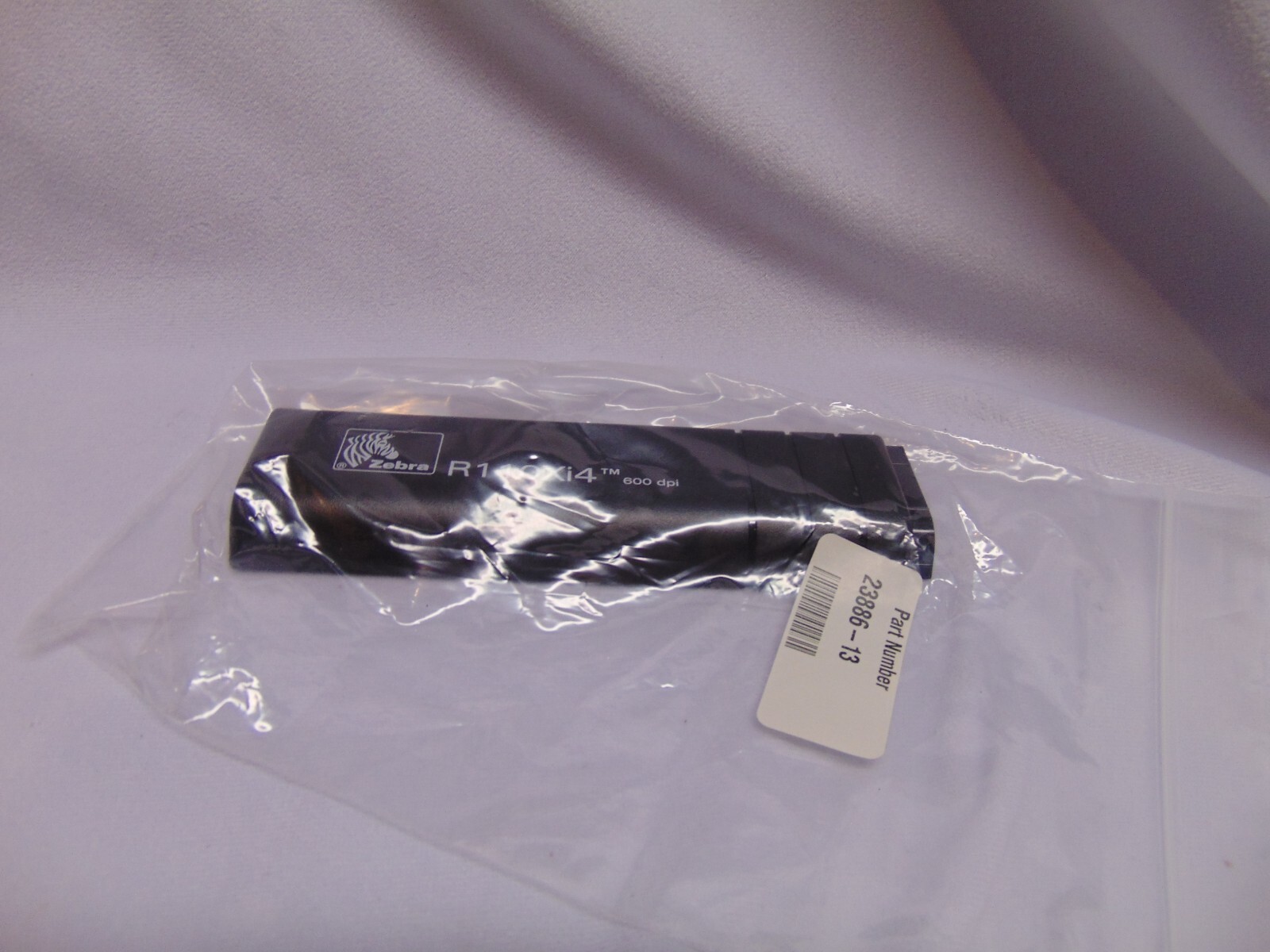 Zebra R110Xi4 600 dpi black plastic panel hardboard cover PN23886-13 new in box