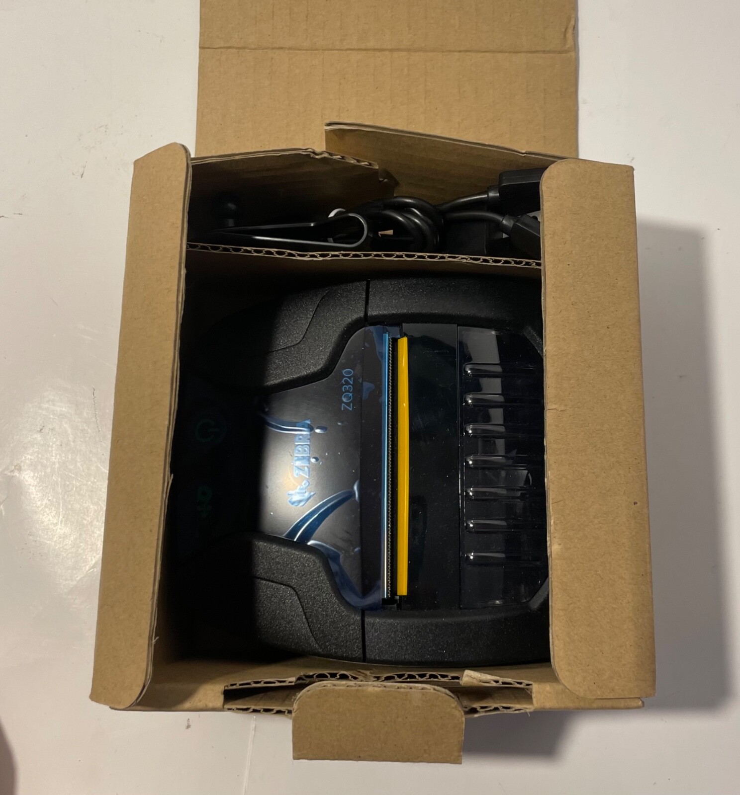 Zebra ZQ320 Mobile Label Printer, Direct Thermal, Wireless P/N: ZQ32-A0E02TL-00